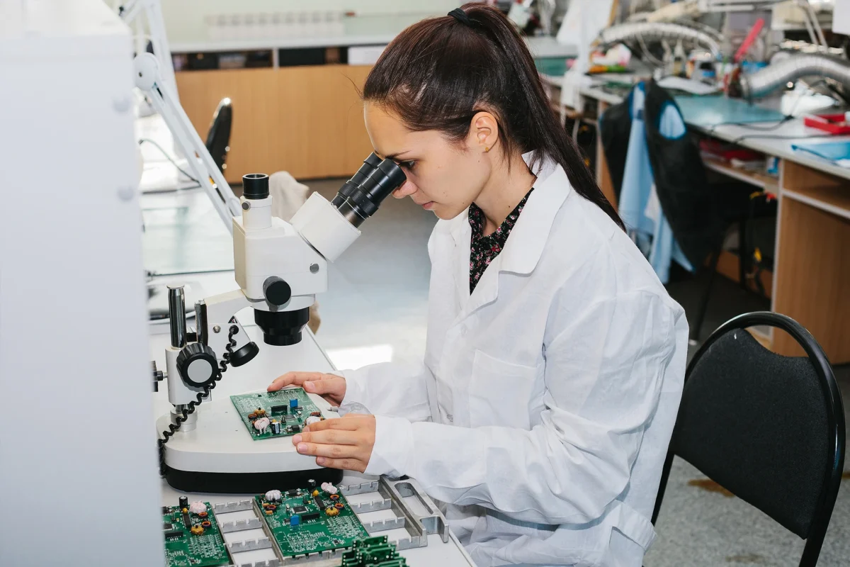 Microchip production factory. Technological process. Computer expert. Manufacturing. Engineering.